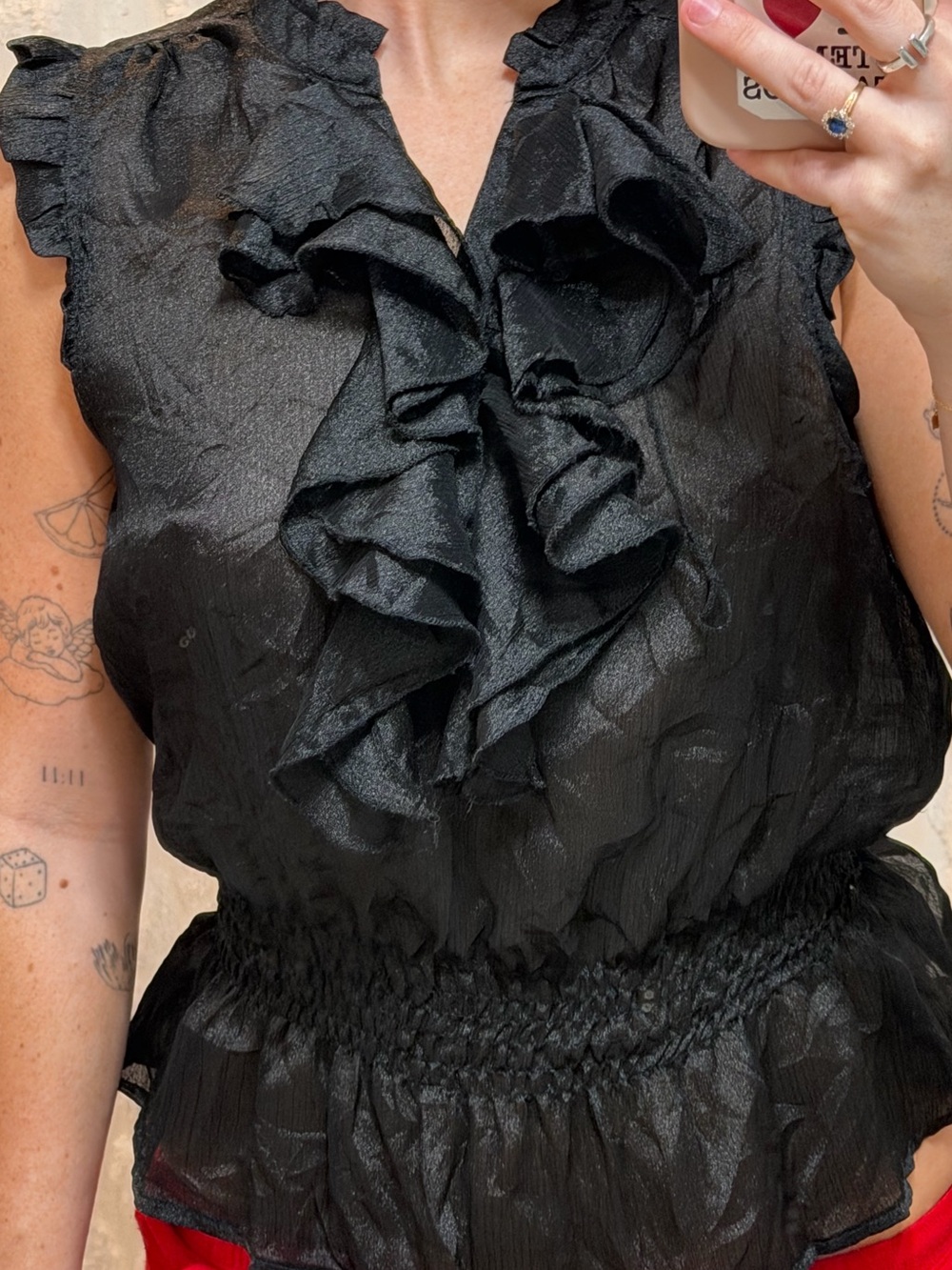Black Ruffled Sleeveless Top